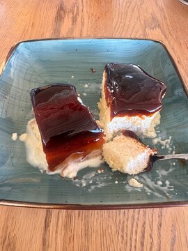 Top view of delicious cake slices served on a ceramic plate