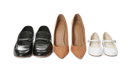Fototapeta premium Pairs of different stylish shoes isolated on white