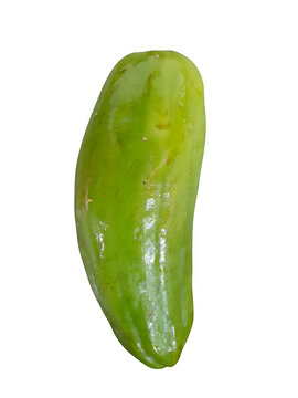 A single ripe green bilimbi fruit with a glossy skin