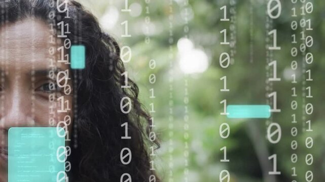 Mature woman gazing up and starting binary overlay outdoors, showing data with turquoise UI