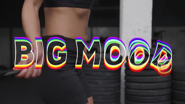 Vertical video: Athlete starting jump rope skipping gym, BIG MOOD text moving over body for fitness