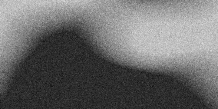Abstract grainy texture with soft blurred gradient transition from dark to light gray