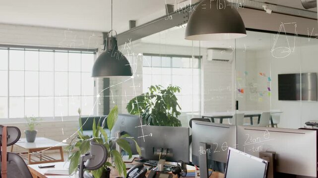 Schematic overlays rising from lamp covering workstation, visualizing tech analytics on monitors