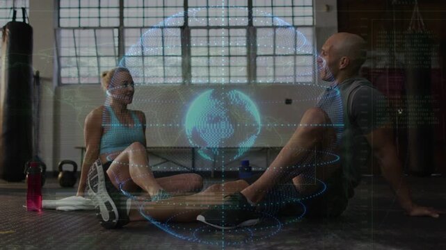 Woman gesturing prompts both reaching into high-five above hologram globe, celebrating gym cooldown