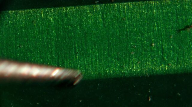 Macro Close-up Shot of Microchip, CPU Processor on Printed Circuit Board, Computer Motherboard with Components Inside of Electronic Device, Part of Supercomputer microscop.