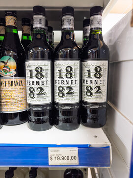 Argentina, El Chalten, March 05, 2026, Fernet 1882, glass bottle, 0,75 l, bottles of Fernet 1882 and Fernet-Branca on a supermarket shelf