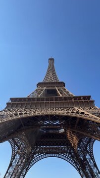 Artistic iron framework creating iconic underside of Eiffel Tower
