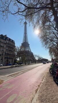 Bright urban morning. Calm scene of city bicycle lane and structures