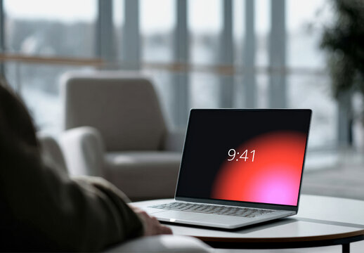 Laptop Screen Mockup Template on Coffee Table in Lounge