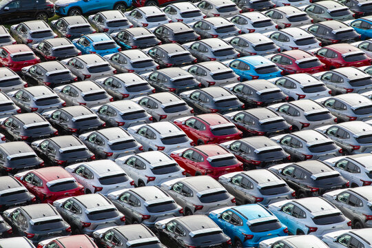 Chevy Trax vehicles staged in high‑density transport rows at the Martinez distribution yard
