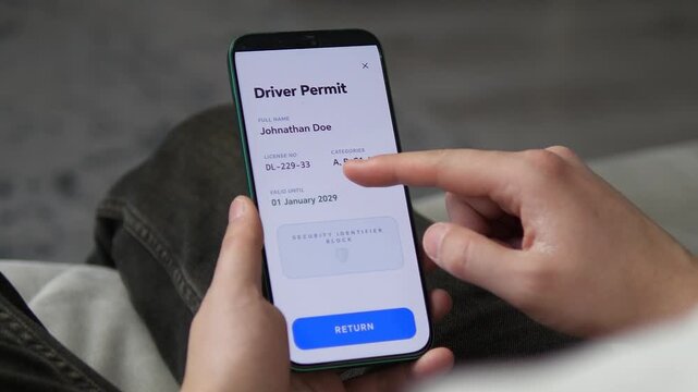 High-quality footage of a user accessing a digital driver's license on a smartphone. Features a modern document center app. Perfect for e-government, digital identity, and paperless office concepts