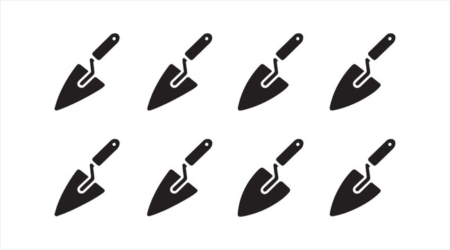 Masonry hand tool symbols set showing plastering and bricklaying trowels in minimal design