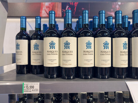 Santiago, Chile, March 09, 2026, Marques de Casa Concha, glass bottle, 0,75 l, bottles of Carmenere red wine by Concha y Toro on a retail store shelf