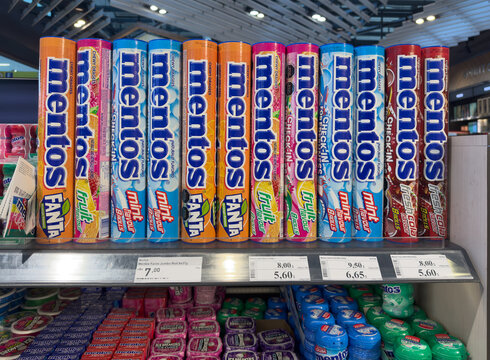 Santiago, Chile, March 15, 2026, Mentos, jumbo rolls, variety of candy flavors including Fanta, Fruit, Mint, and Fresh Cola on a retail store shelf
