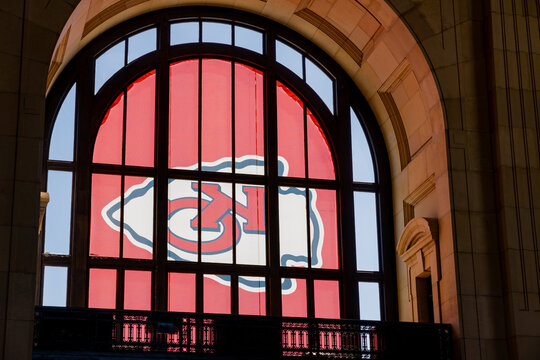 View through a window of a Kansas City Chiefs banner at Union Station Kansas City. Kansas City, Missouri, September 2022