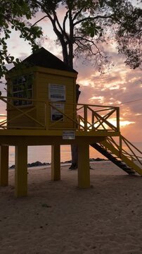 The lifeguard hut at Folkestone Marine Park, Holetown, Barbados at sunset