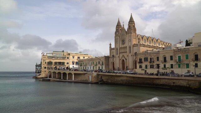 Neo-Gothic architecture of the Carmelite Parish Church in Balluta Bay, Malta