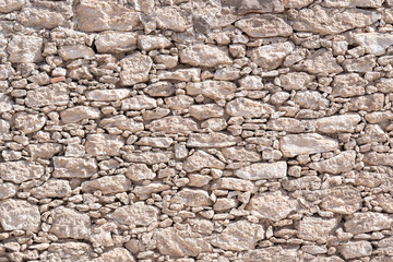 Fototapeta premium textura de mampostería de muro de piedra rústico de pueblo mágico en México 