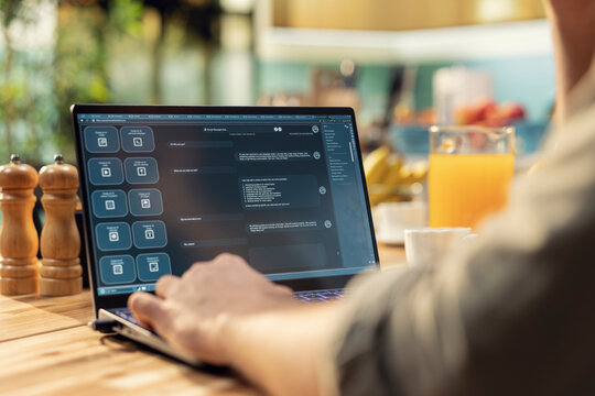 Man engaging with AI-powered chatbot, everyday life use of artificial intelligence, generative software, autonomous and real-time tools, support problem solving and productivity at home.