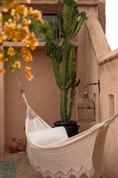 A crochet hammock on a moroccan rooftop