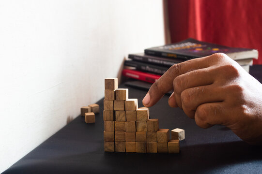 Business Growth Concept with Small Wooden Blocks on the Table