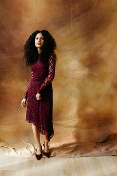 Woman looking up wearing dress