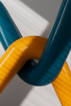 3D Intertwined Orange and Blue Tubes