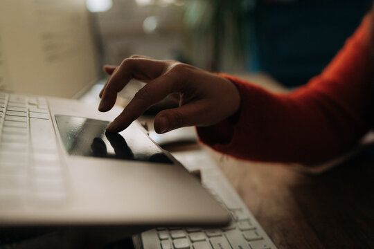 Close Up of Hand Using Laptop Trackpad