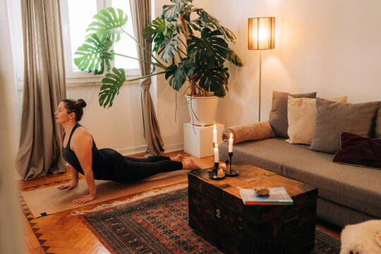 Cobra Pose Yoga Practice in Living Room