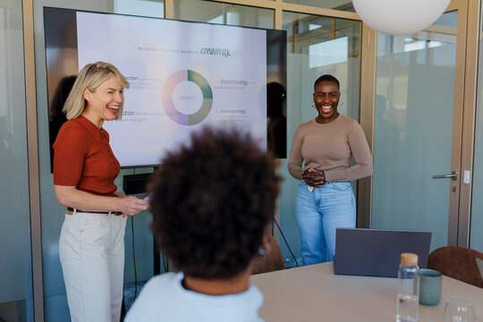 Businesswomen presenting a project during office meeting