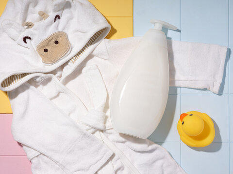 Cute unicorn hooded bathrobe for baby with duck and lotion bottle