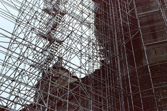 View of a scaffolding for the restoration of a fortification, France.