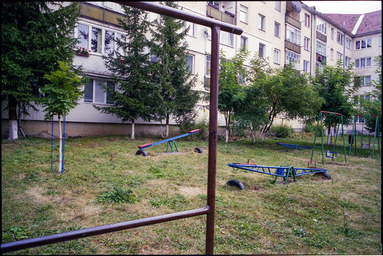 A children's playground on a meadow in a residential area