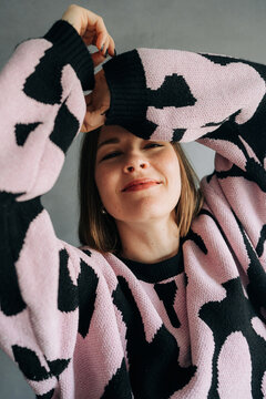 Portrait of Woman in Cozy Sweater Indoors