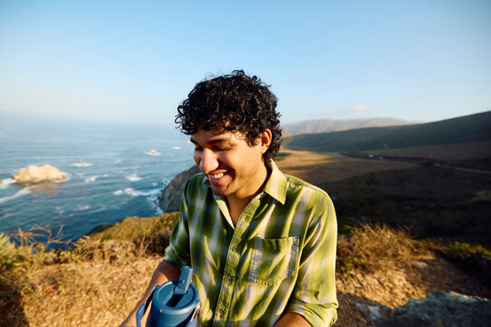 Smiling Man Standing on the Vantage point in Big Sur