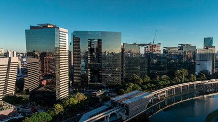 Aerial view of Pinheiros River and Berrini financial district skyscrapers at sunset, Sao Paulo, Brazil - Drone DJI Mavic 3 © ANDRE
