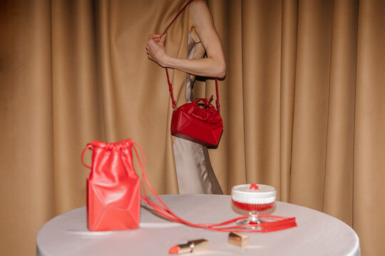 Red Handbag Fashion Still Life With Model