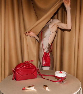Red Handbags With Satin Dress and Lipstick