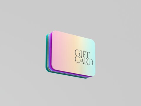 Gift Card Stacked With Colorful Design on a Plain Background