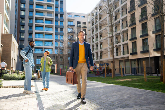Businessman walking in the city