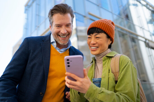 Mentor reviewing project update with young entrepreneur