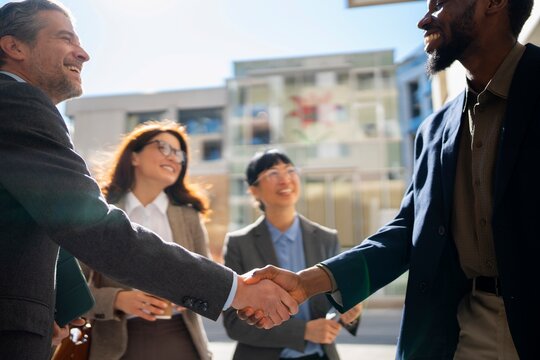 Meeting of professionals in a city setting