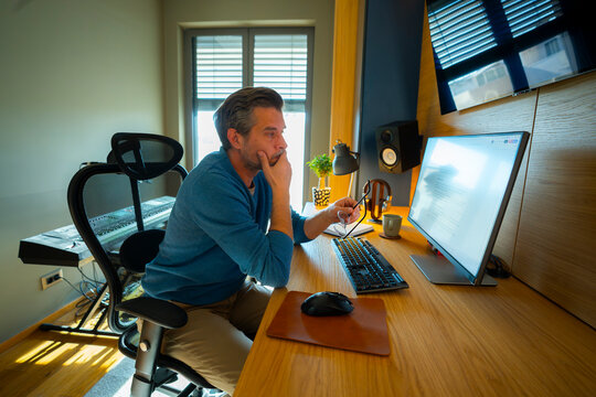 Focused professional working from home office