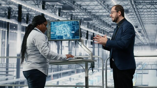 Green screen laptop used by businesspeople monitoring PCB smart factory workflow with AI neural network. Executives use mockup notebook and machine learning to track microchip production, camera B