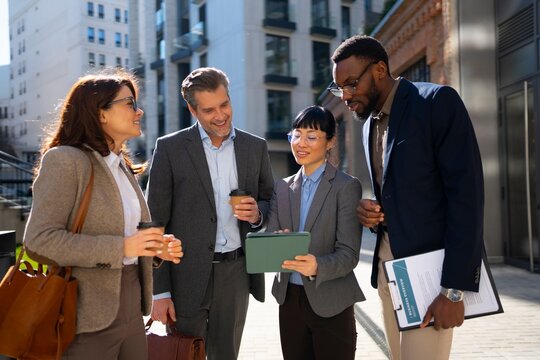Meeting of professionals in a city setting