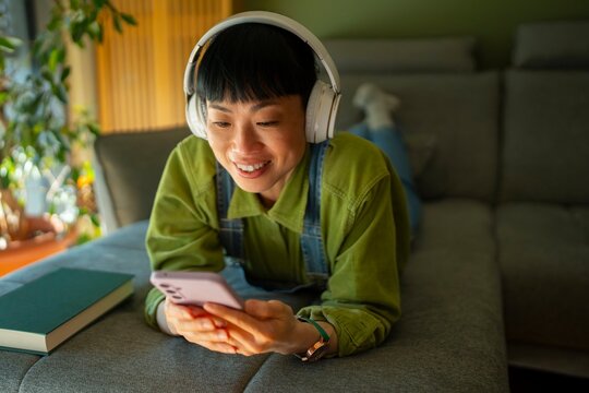 Chilling on the couch with headphones