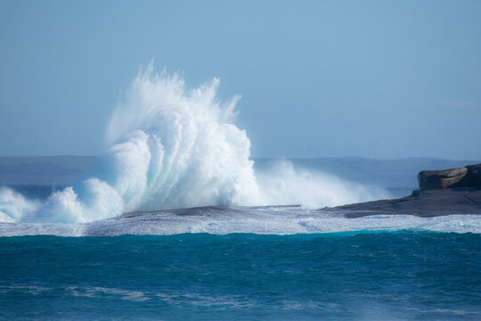 A wave crashing onto rocks. Great Australian Bight. South Australia.