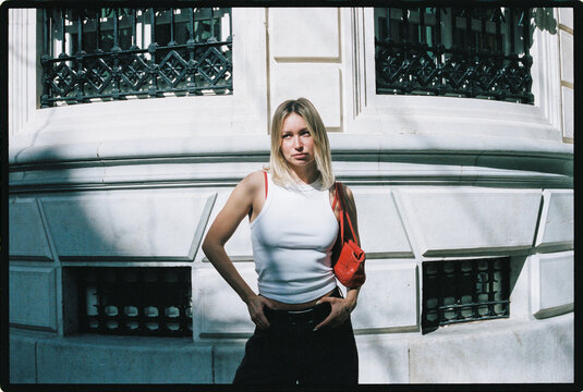 Urban portrait with red bag