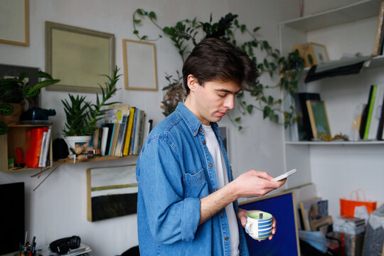 man looking at his phone