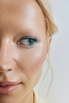 Macro beauty portrait woman with natural skin and trendy makeup